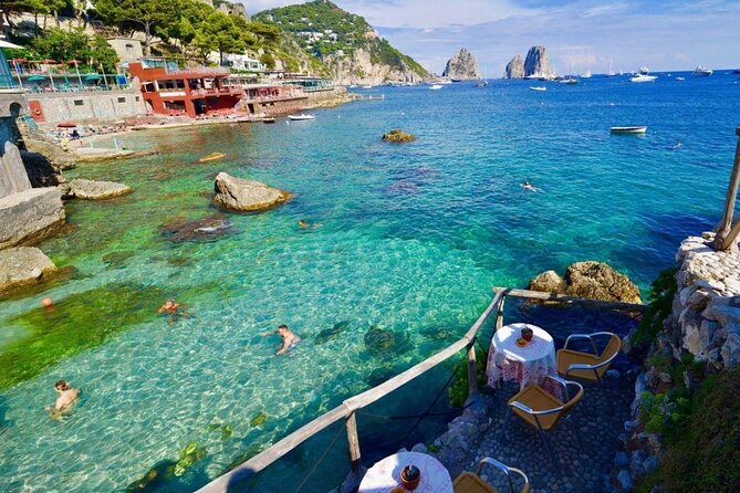 Full Day Private Boat Tour to Capri from Positano - Faraglioni, White Grotto, and the return ride