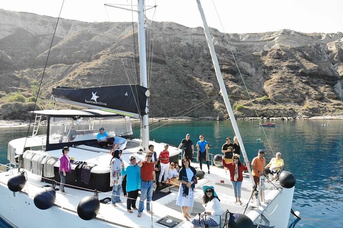 Half-Day Exclusive Catamaran Cruise in Santorini with Meal and Open Bar - Thirasia, the best place to swim and eat