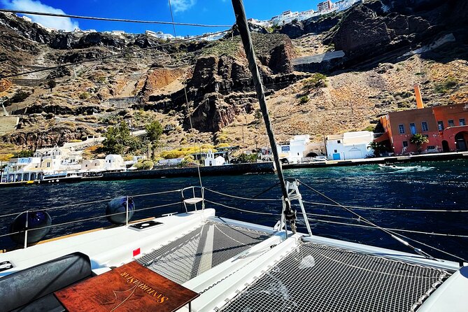 Half Day Premium Catamaran Cruise in Santorini including Oia - Thirassia, swimming, and the BBQ meal