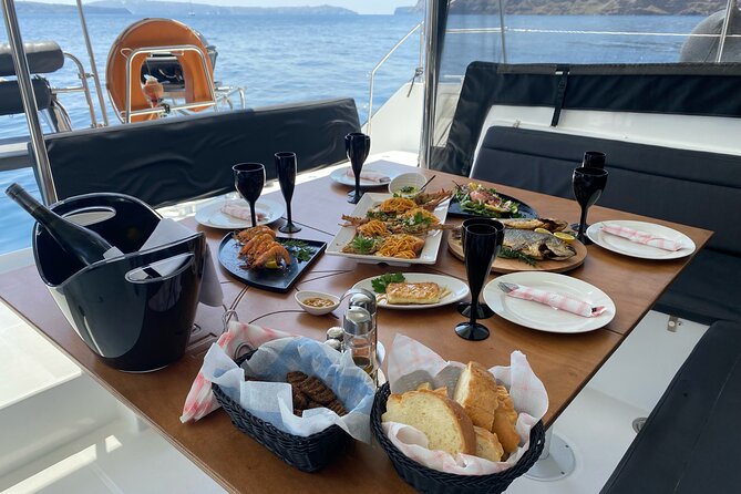 Half Day Premium Catamaran Cruise in Santorini including Oia - Food, drinks, crew, and the premium feel