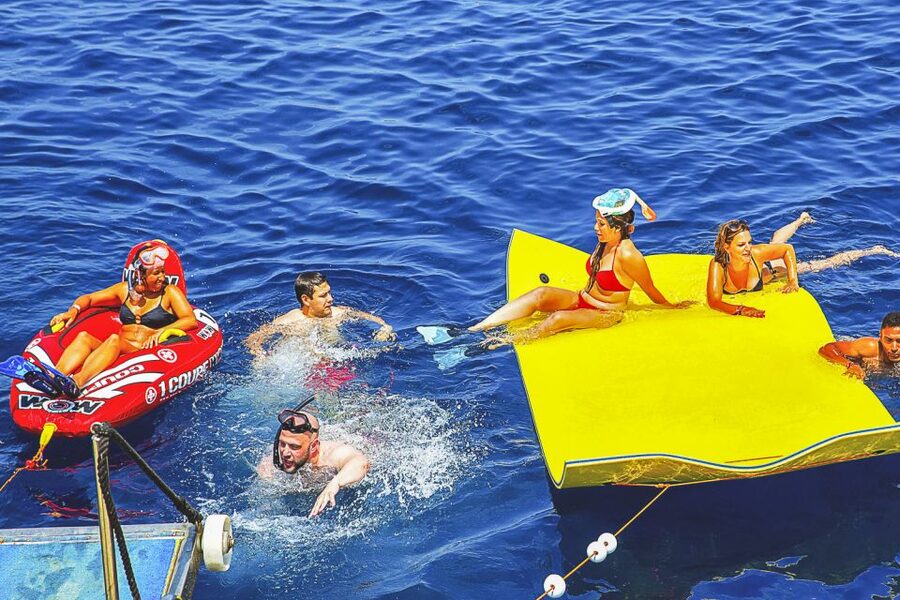 Ibiza: Beach Hopping Cruise w/ Paddleboard, Food, & Drinks - The open-water activity stop
