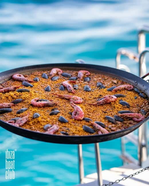 Ibiza: Formentera Sunset Boat Part with Drinks and Food - Returning to the boat at La Savina