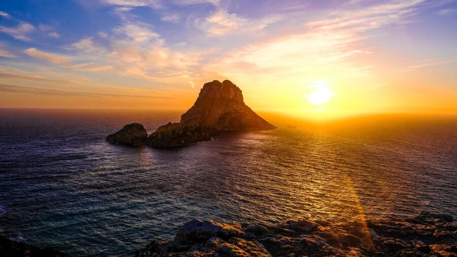 Ibiza: Midday or Sunset Sailing with Snacks and Open Bar - The swimming stop in a sheltered bay