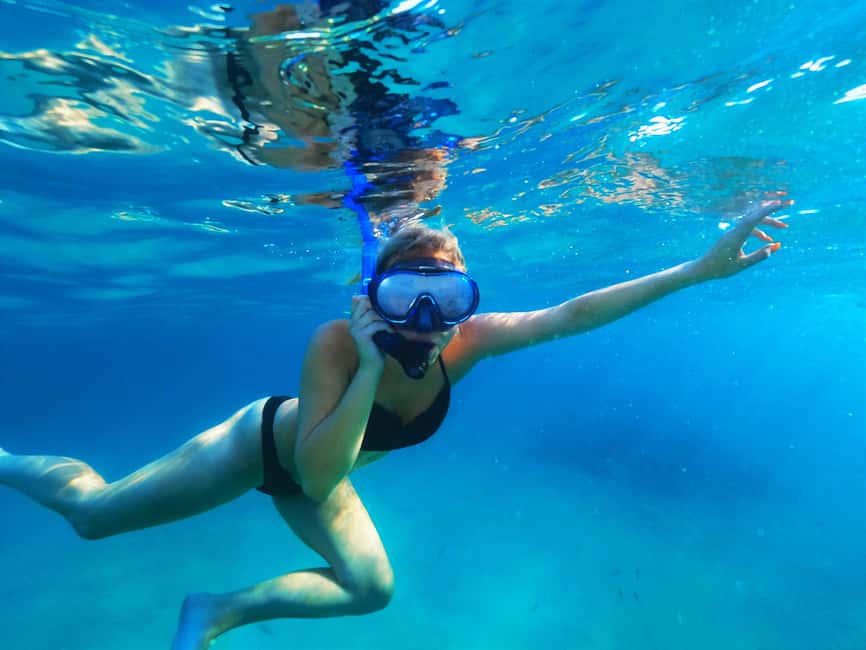 Ibiza: Snorkeling and SUP Paddle, Beach and Cave Boat Tour - Cala Comte: Clear Water and a Choice of Activities