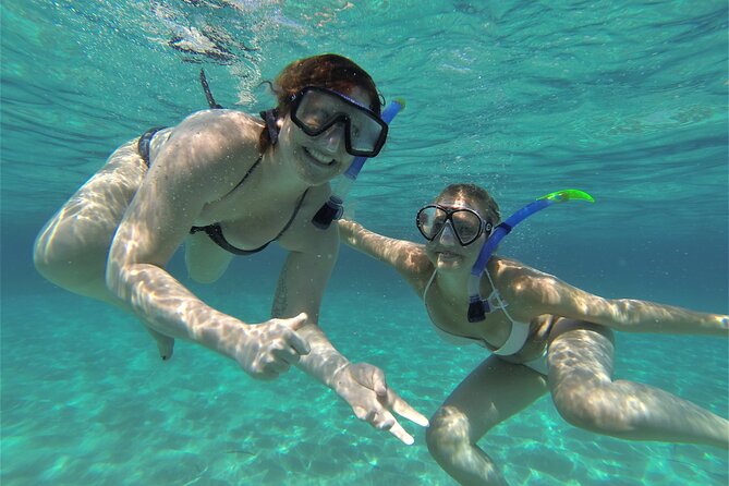 Ibiza Snorkeling Beach and Cave Tour - Drinks, music, and the onboard atmosphere