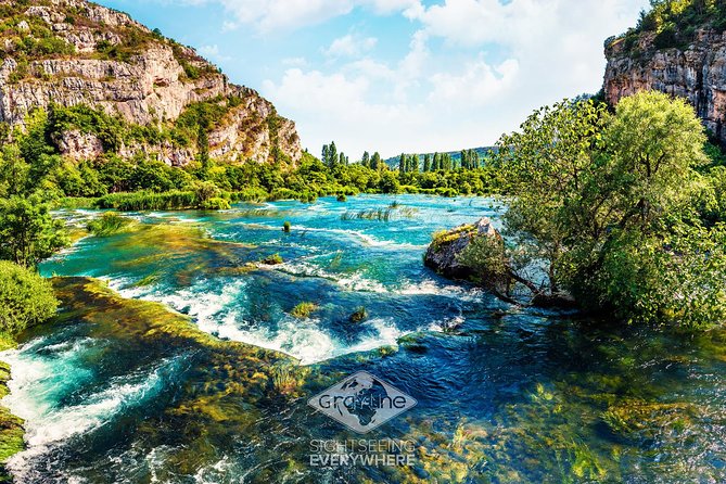 Krka Waterfalls Day Tour with Boat Ride from Split and Trogir - Skradinski Buk: wooden paths and old watermills