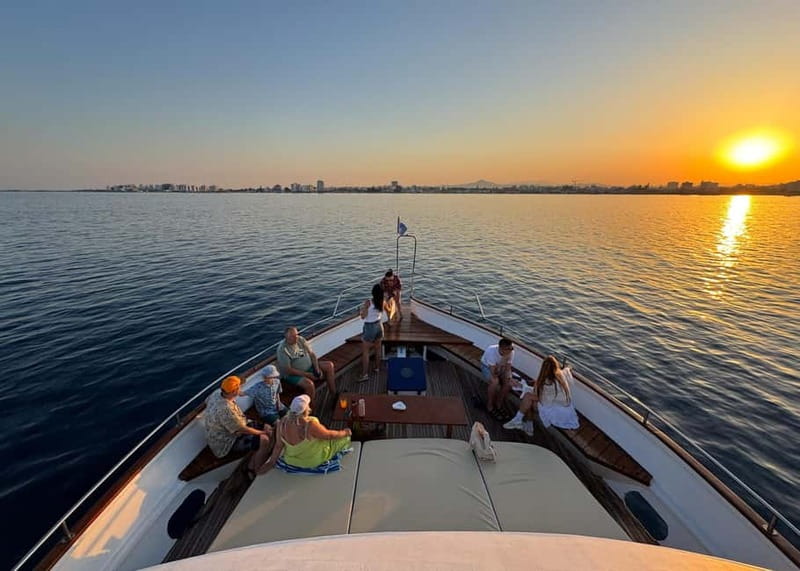 Larnaca: Sunset Cruise with a Glass of Wine - Mackenzie Beach and the 30-minute swim stop