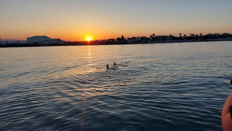 Larnaca: Sunset Cruise with Unlimited Wine & Beers - Returning past Finikoudes Beach