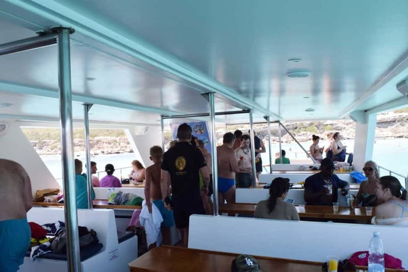 Latchi: Nafsika II Boat Cruise to the Blue Lagoon - Drinks, fruit, and the onboard bar