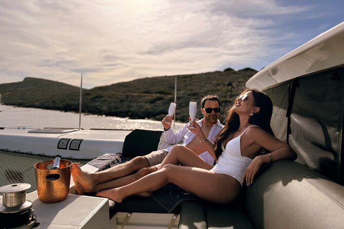 Luxury Catamaran Cruise, Dia Island –Open Bar & Lunch -Top Rated! - Three Hours in Dia Island’s Quiet Bay