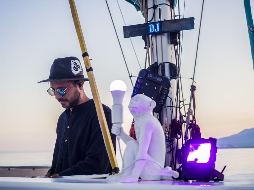 Malaga: Catamaran Sunset or Night Cruise w/ Live DJ & Drink - Live DJ music and the changing mood onboard