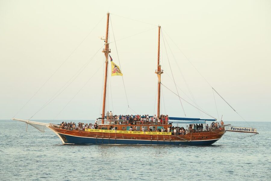 Malta: Lazy Pirate Boat Party with Drinks & Food - Malta’s Coastline as Daylight Fades