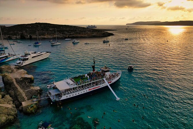 Malta Sunset Boat Tour: Bugibba to Comino Blue Lagoon Cruise - St. Paul’s Island, Ghadira Bay, and Ahrax Point