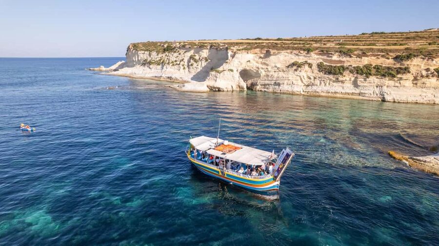 Malta: Sunset Boat Tour to St. Peter’s Pool and South Coast - Salt pans carved into the rock
