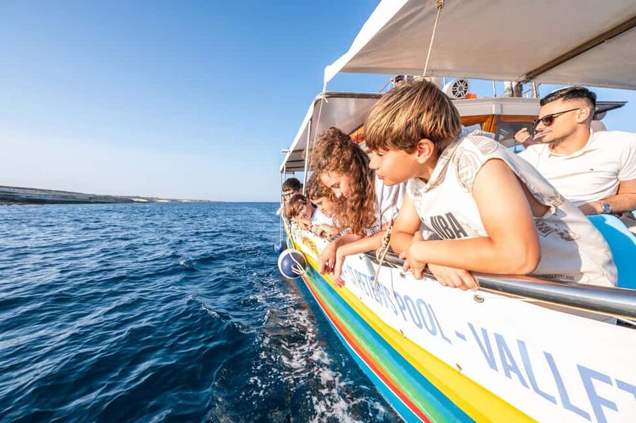 Malta: Sunset Boat Tour to St. Peter’s Pool and South Coast - Marsaxlokk Lighthouse and the open-water return