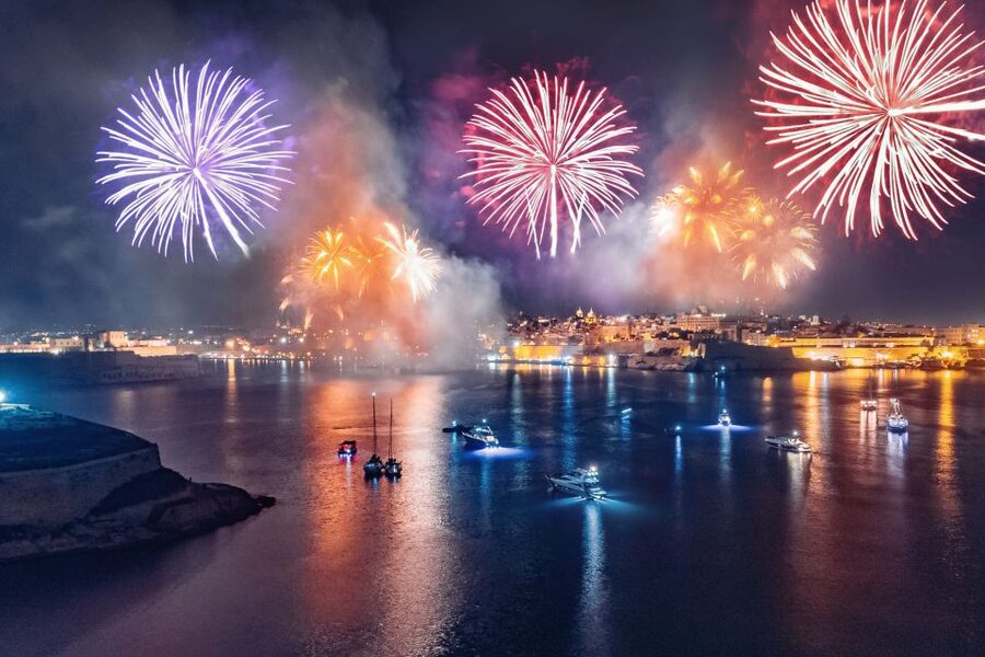 Malta: Valletta, Sliema, Bugibba Fireworks Festival Cruise - Entering Valletta’s Grand Harbour after dark