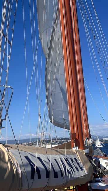 Marseille: Calanques Sailing Cruise with Lunch and Wine - The first Calanque stop: swimming, snorkeling, and lunch