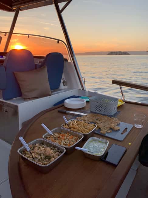 Marseille: Sunset Boat Cruise with Buffet and Organic Wine - Swimming in a sheltered cove