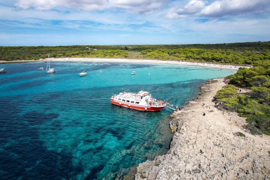 Menorca: Full-Day Boat Tour with Paella Lunch - Two hours at Cala en Turqueta