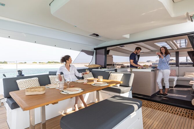 Mykonos: Brand-New Catamaran Cruise with Meal, Drinks & Transport - Booking, weather, and cancellation advice