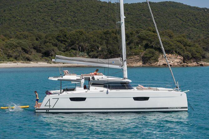 Mykonos: Brand-New Catamaran Cruise with Meal, Drinks & Transport - Rhenia and the clear-water swim stop