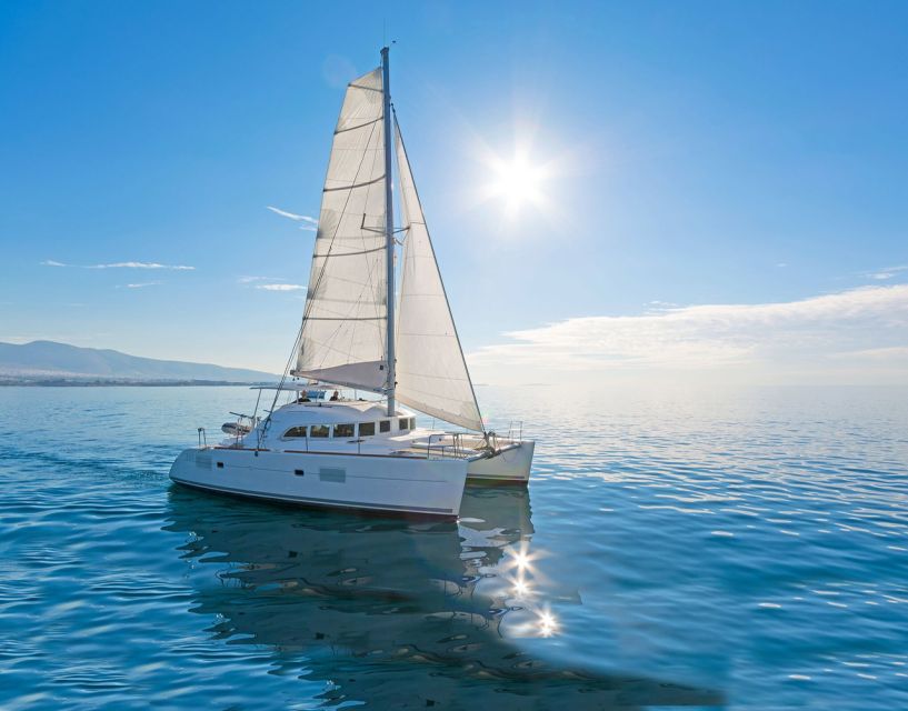 Mykonos: Catamaran Cruise With Meal and Drinks - Leaving Mykonos behind by catamaran