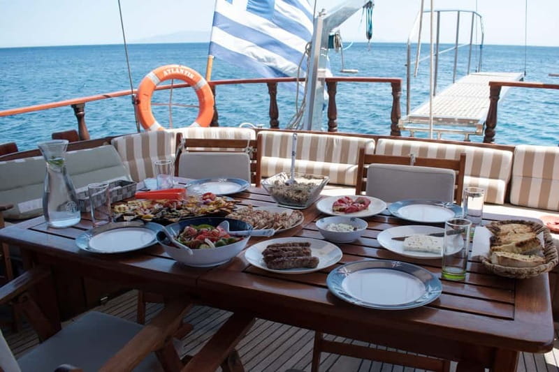 Mykonos: Delos and Rhenia Islands Cruise with BBQ Meal - The Return to Mykonos