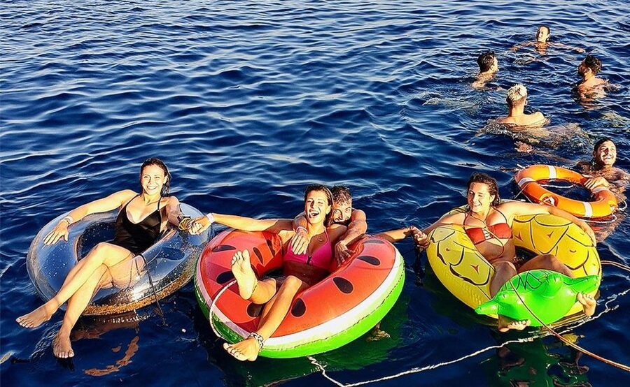 Mykonos: Sunset Boat Party with Open Bar & Live DJ - The Aegean swim stop