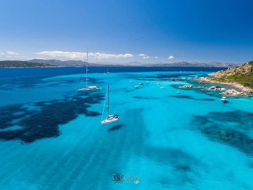 Olbia: Dolphin Watching & Snorkeling Boat Tour near Figarolo - Cala Moresca for swimming and Sardinian snacks