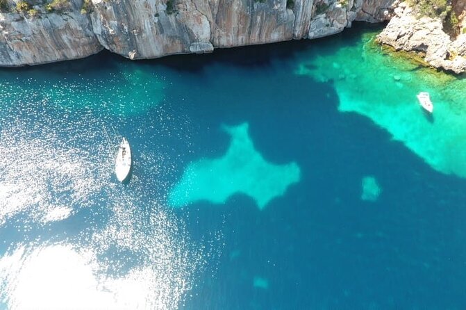 One day excursion on a sailing boat in the Gulf of Alghero - What the eight-hour sailing day is really like