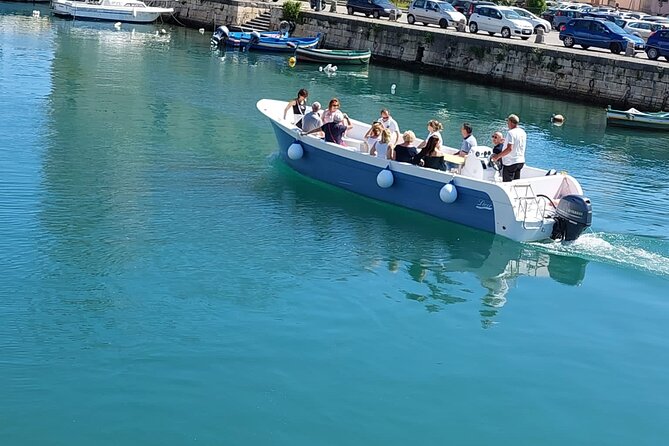 Ortigia Island and Sea Caves Boat Tour with Prosecco - Fonte Aretusa and the fresh-water swim