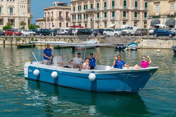 Ortigia Island and Sea Caves Boat Tour with Prosecco - Commentary, languages, and what you will actually learn