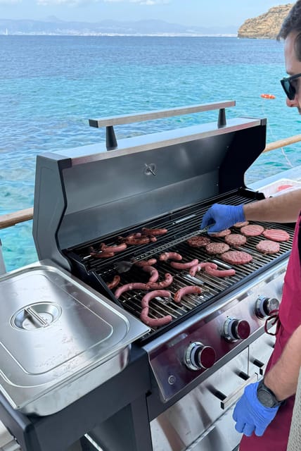 Palma Bay: Boat Tour with BBQ, Snorkelling, & Sunset Option - BBQ lunch, fruit, and the bar