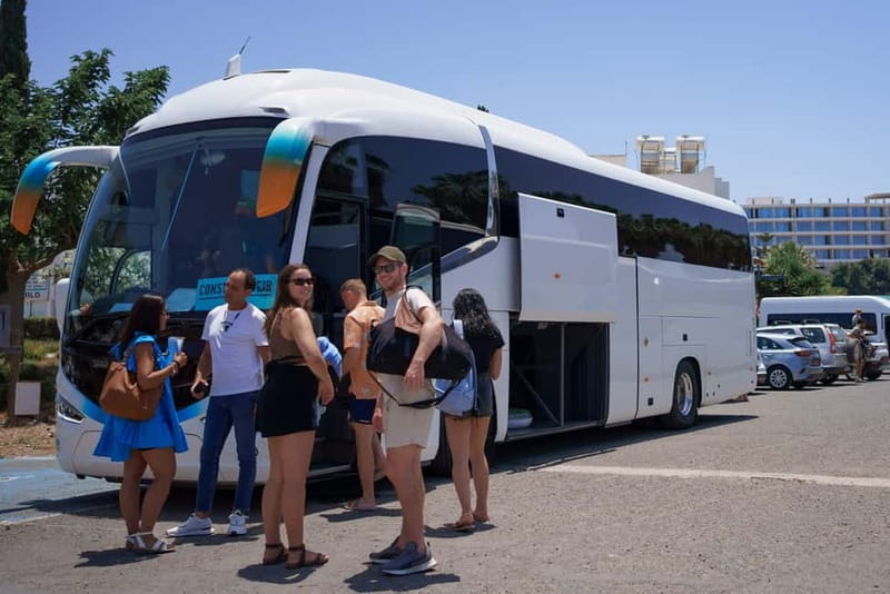 Paphos/Akamas: Blue Lagoon Bus & Boat Tour with Water Slide - Swimming in the Blue Lagoon