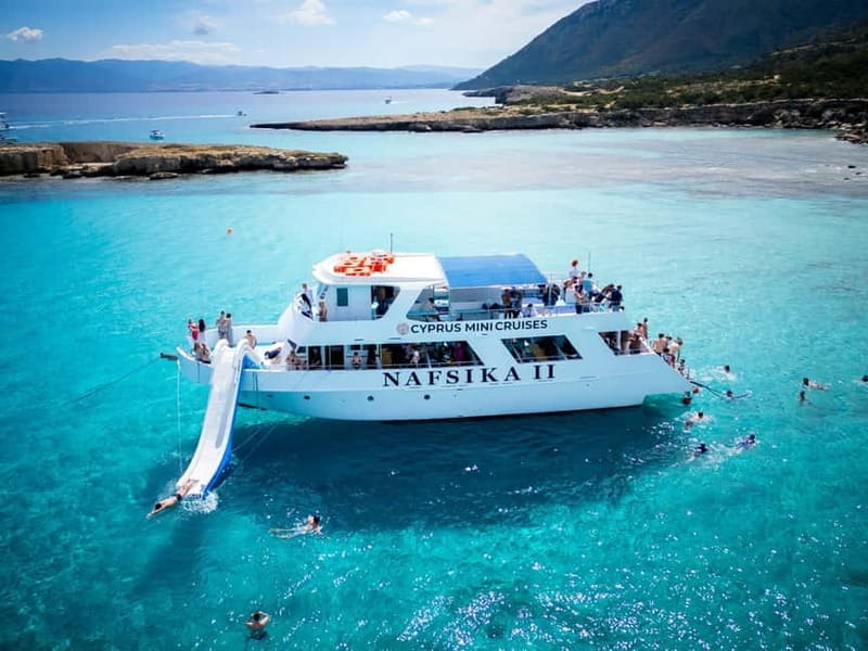 Paphos/Akamas: Blue Lagoon Bus & Boat Tour with Water Slide - Aphrodite’s Baths and the Gardens
