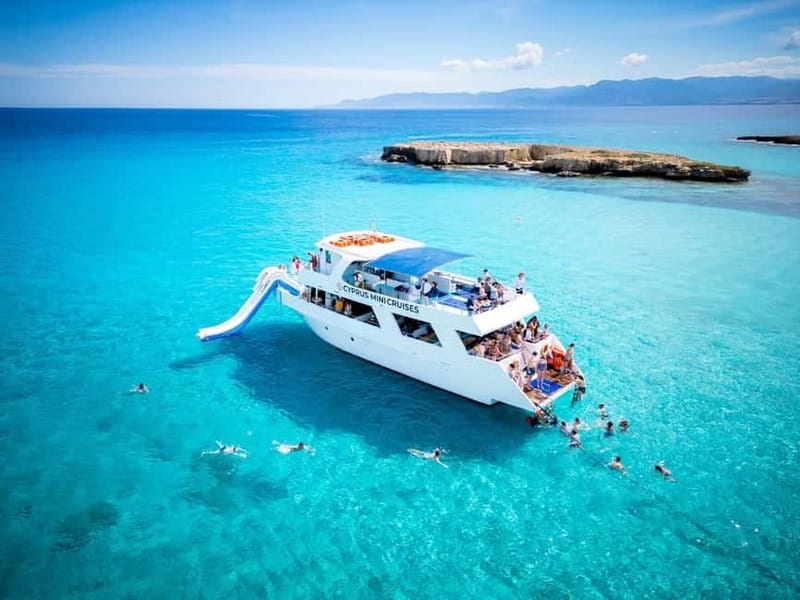 Paphos/Akamas: Blue Lagoon Bus & Boat Tour with Water Slide - Edro III and the sea caves: a strong opening