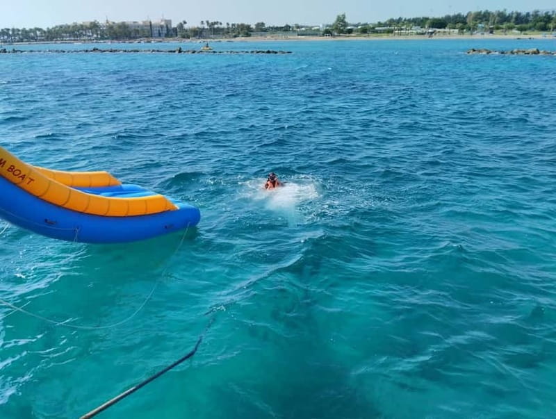 Paphos: Glass Bottom Boat Trip with Swimming or Snorkeling - The slide, jump, and family appeal