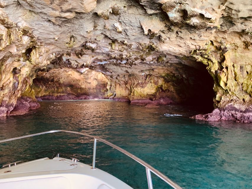 Polignano a Mare: Cave Boat Tour with Aperitif - Grotta Palazzese and the cliffside town