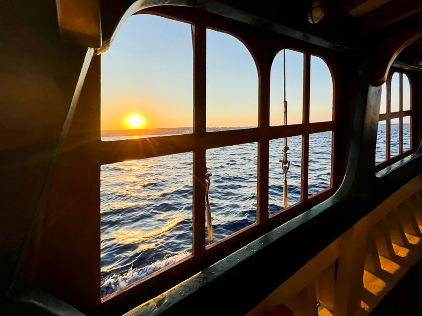 Rhodes: Sunset Cruise with Greek BBQ and Unlimited Drinks - Greek BBQ, cold drinks, and a slow return sail