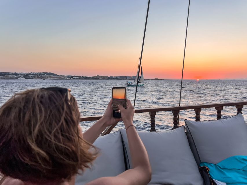Rhodes: Sunset Cruise with Greek BBQ and Unlimited Drinks - Meeting point, language, and practical details