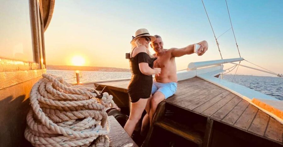 Rhodes: Sunset Cruise with Unlimited Aperol, Beer, and Wine - Leaving Mandraki Harbour for an easy evening at sea