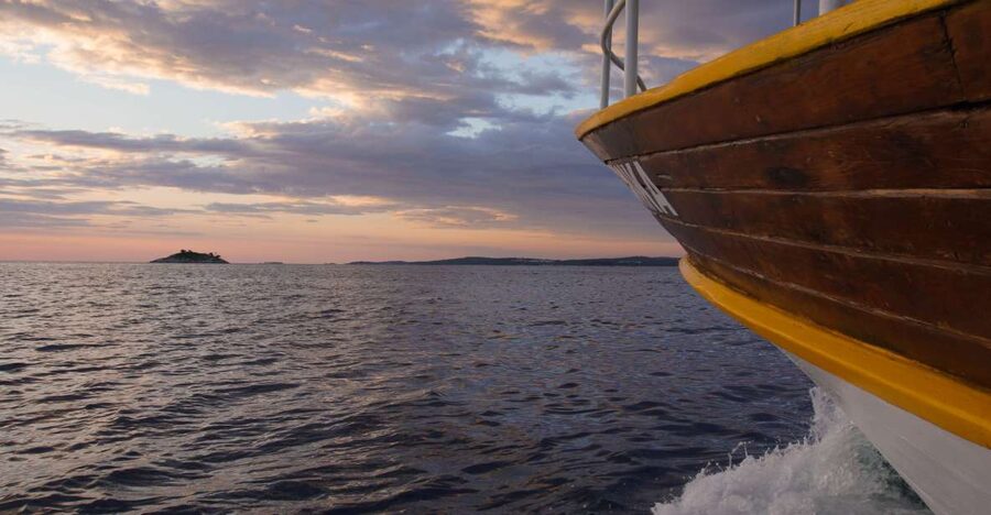 Rovinj: Sunset Boat Trip with Dolphin Watching - Leaving Valdibora With Rovinj Behind You