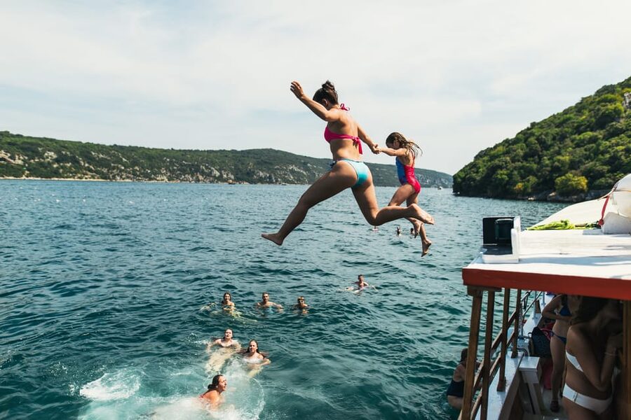 Rovinj: Sunset Cruise with Swim Stop, Drinks, and Fruits - The swim stop and boat jumps