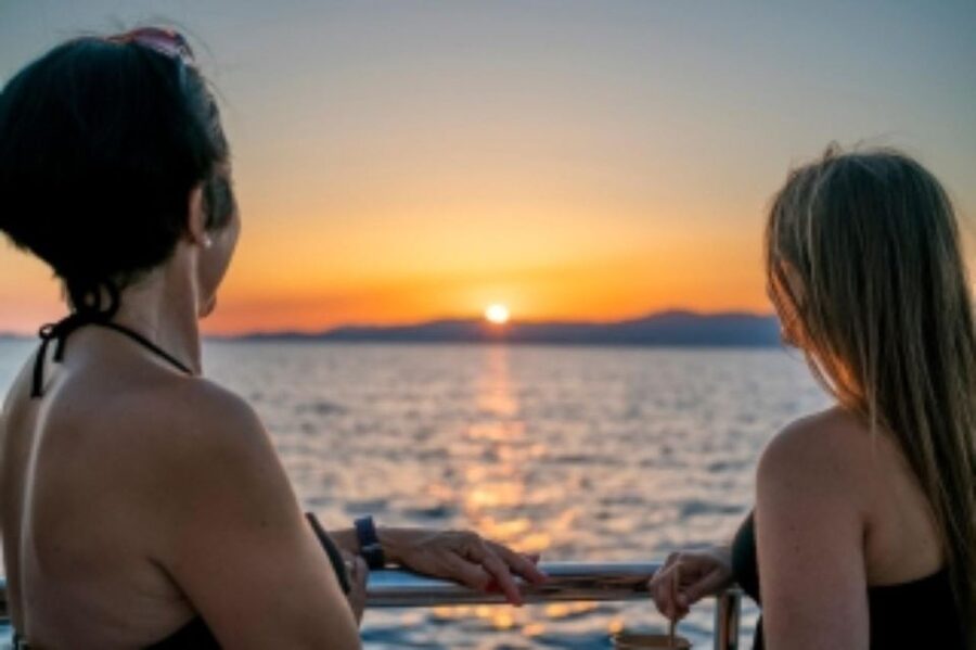 S'Arenal: Sunset Catamaran Cruise with BBQ - The swimming stop near protected coastal areas