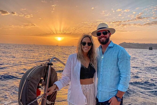 Santorini Catamaran Cruise with Greek Meal, Open-Bar and Sunset - Sunset: worth choosing, with one warning