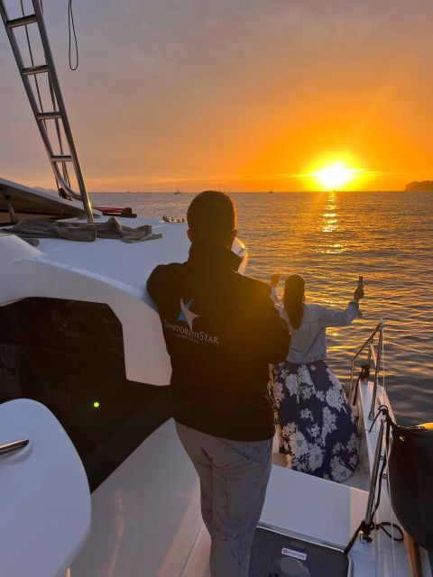 Santorini Catamaran Cruise with Swimming, Meal and Open Bar - Key points at a glance