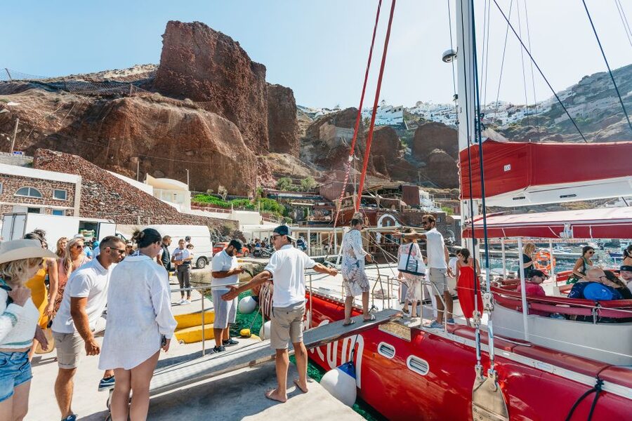 Santorini: Catamaran Tour with BBQ Dinner, Drinks, and Music - Red Beach brings the best color contrast
