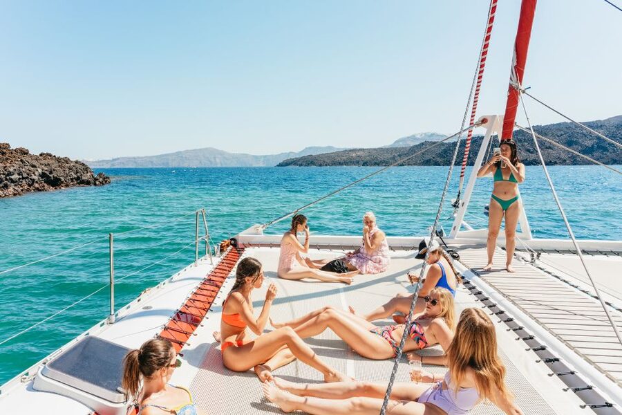 Santorini: Catamaran Tour with BBQ Dinner, Drinks, and Music - Sunset sailing or morning cruise?