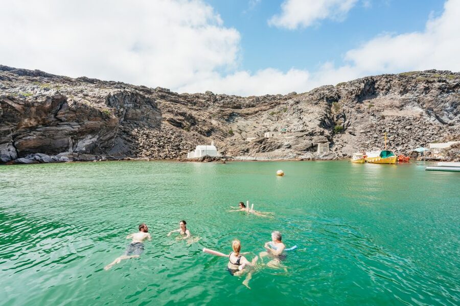 Santorini: Luxury Catamaran Day Trip with Meal and Open Bar - Choosing morning sailing or the Santorini sunset