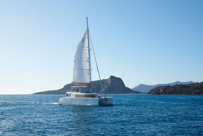 Santorini Platinum Catamaran Cruise with Meal, BBQ and Open Bar - Thirassia provides the meal and the longest stop